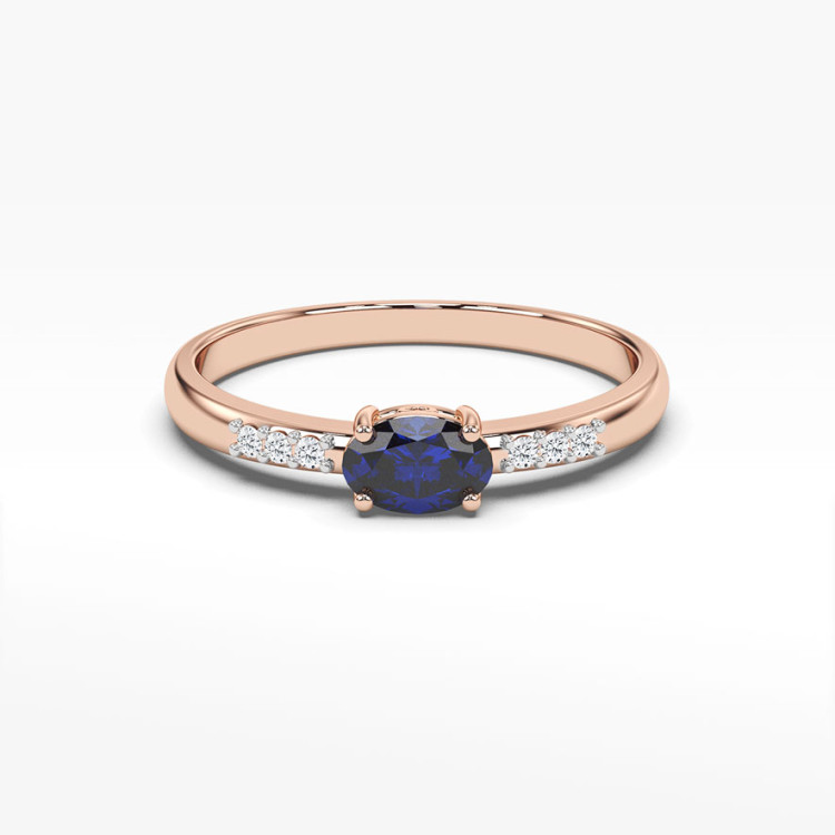 Pierścionek z rózowego złota z szafirem