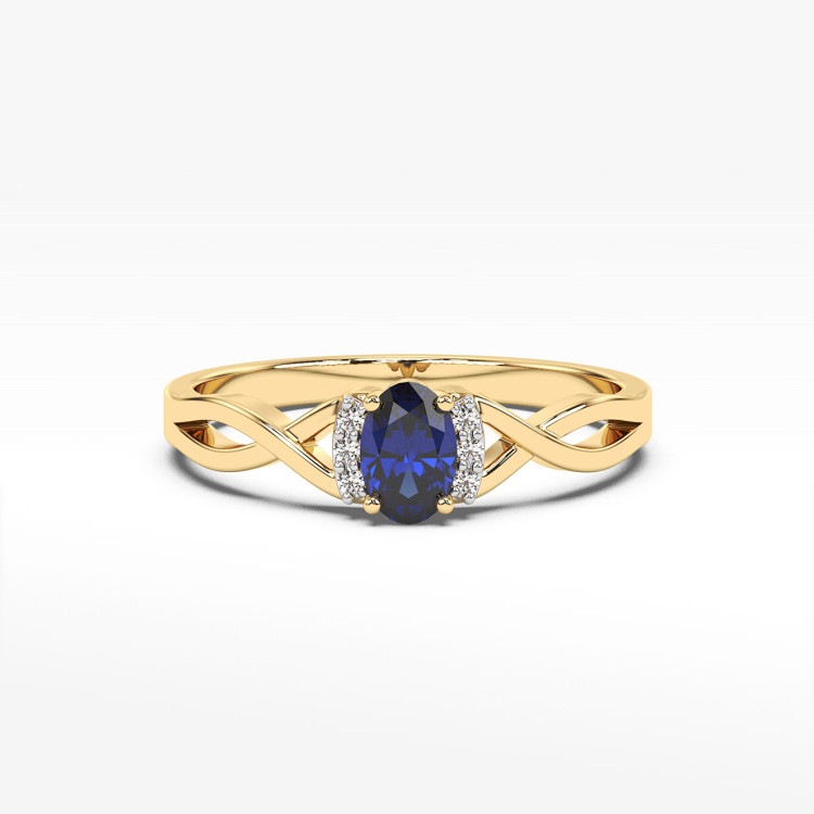 Złoty pierścionek z szafirem