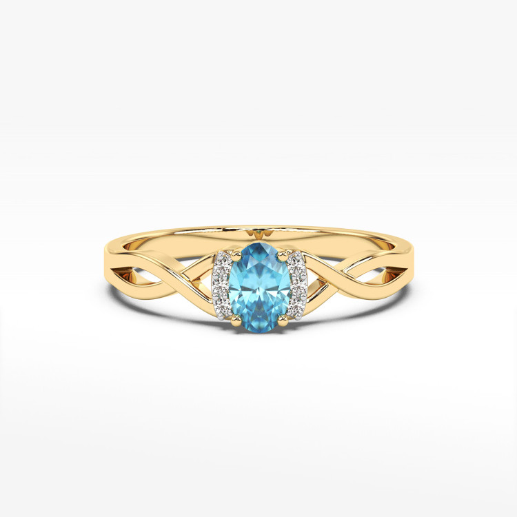 Złoty pierścionek z topazem