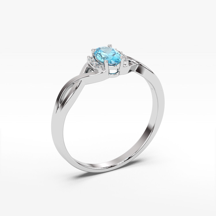 Złoty pierścionek z topazem