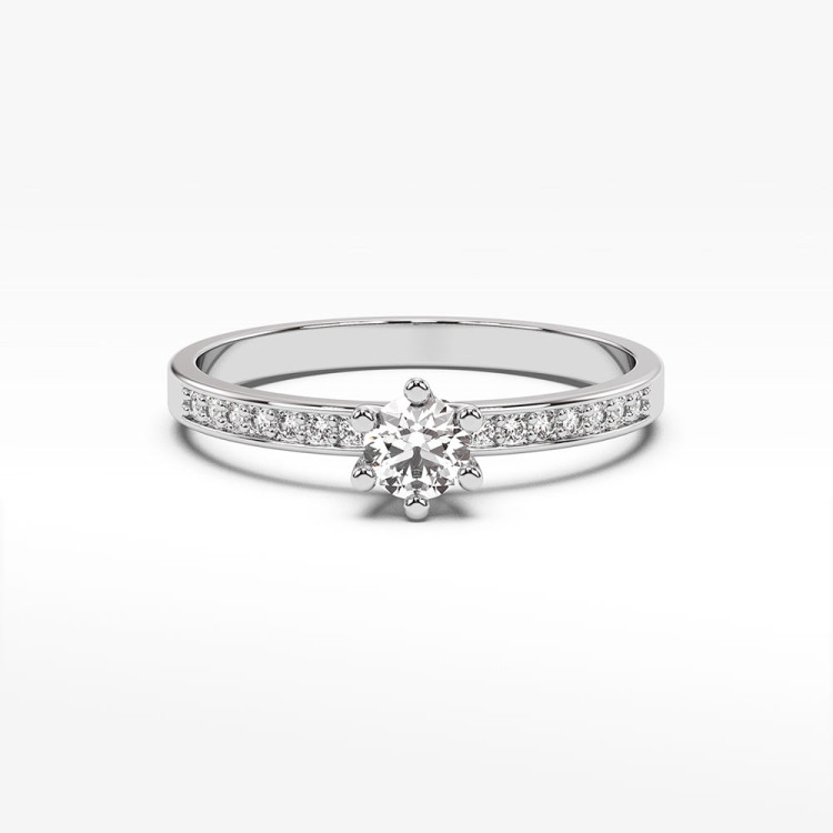 Pierścionek zaręczynowy z białego złota bogato zdobiony diamentami