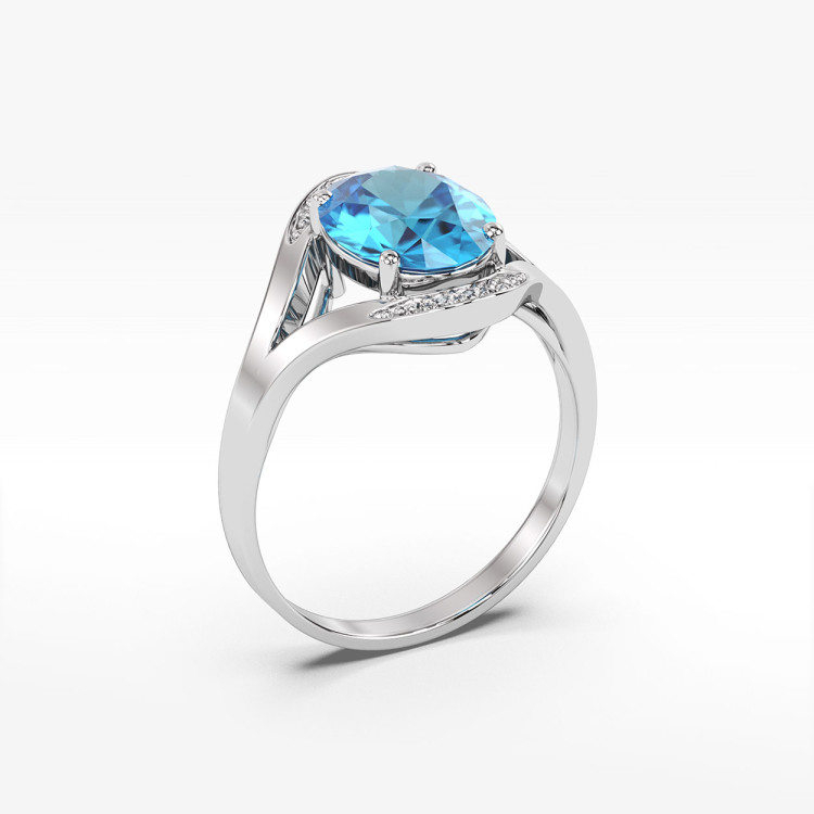 Pierścionek zaręczynowy z białego złota z topazem