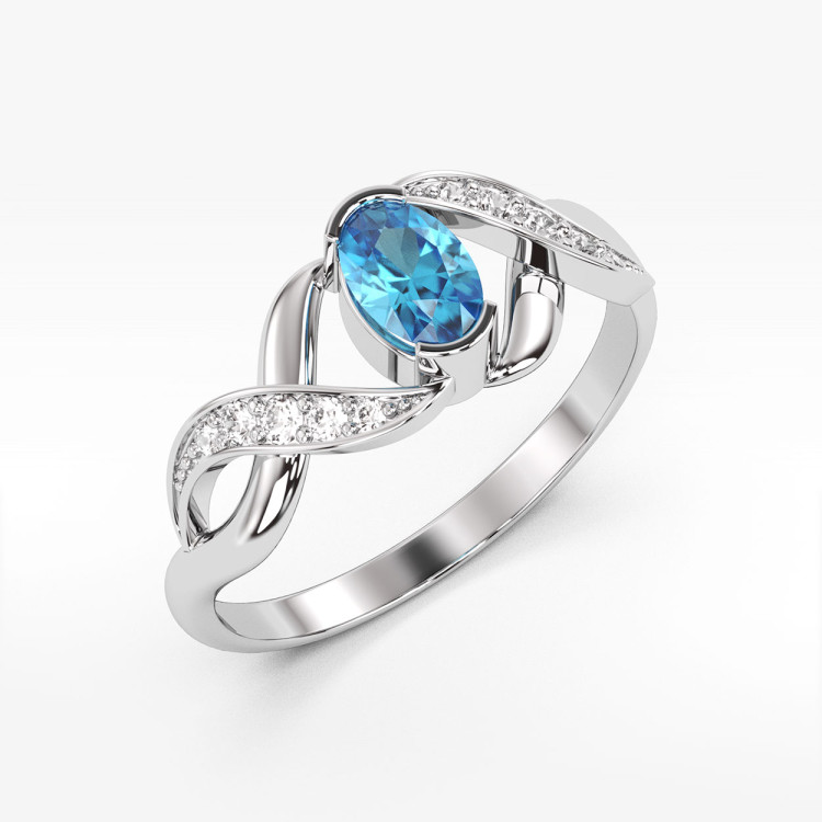 Pierścionek z białego złota z topazem