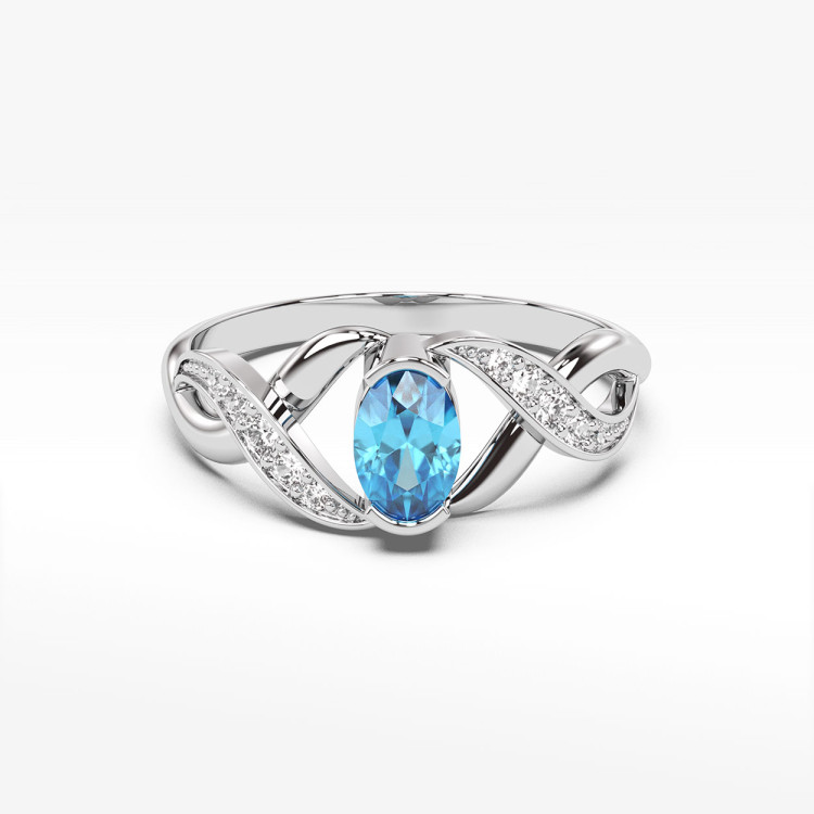 Pierścionek z białego złota z topazem