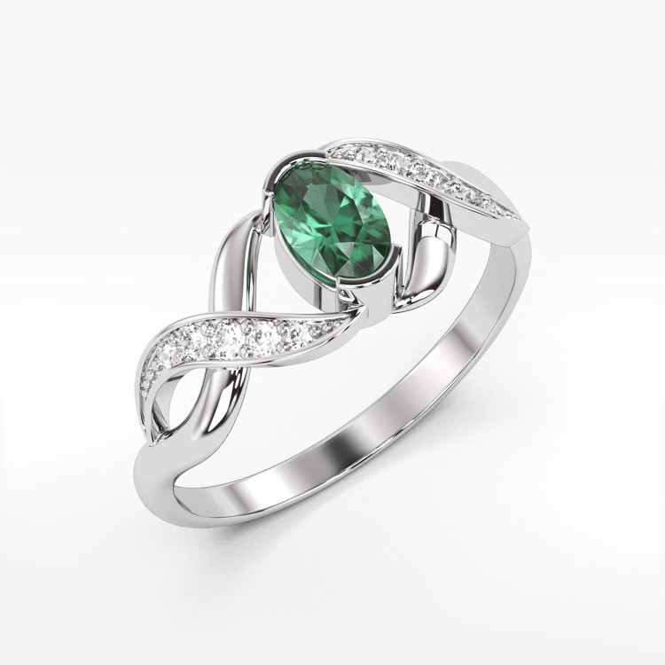 Pierścionek ze złota ze szmaragdem i diamentami