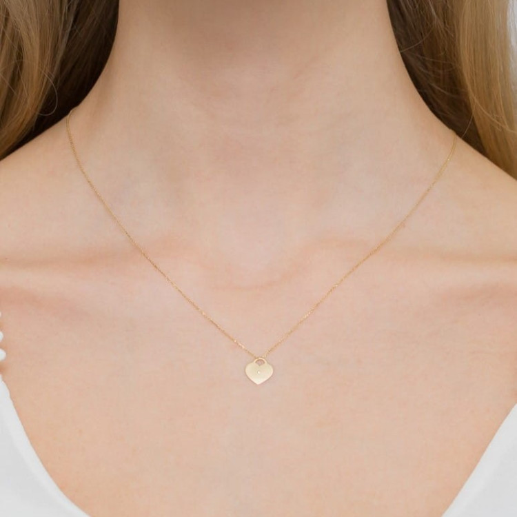 Złota celebrytka serduszko z diamentem