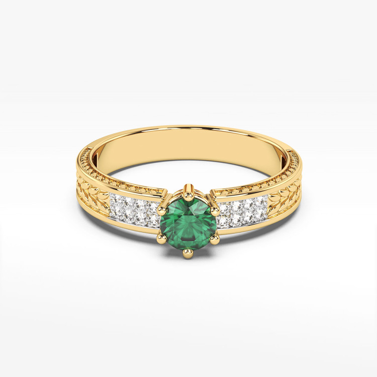 Pierścionek ze szmaragdami i diamentami