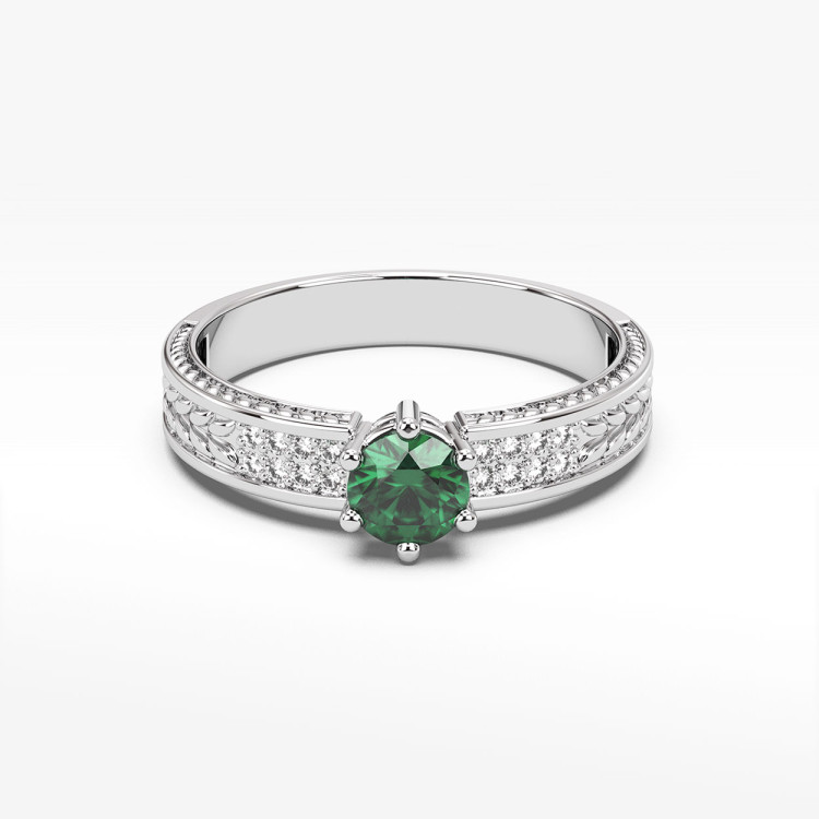 Pierścionek ze szmaragdami i diamentami