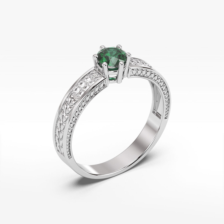 Pierścionek ze szmaragdami i diamentami