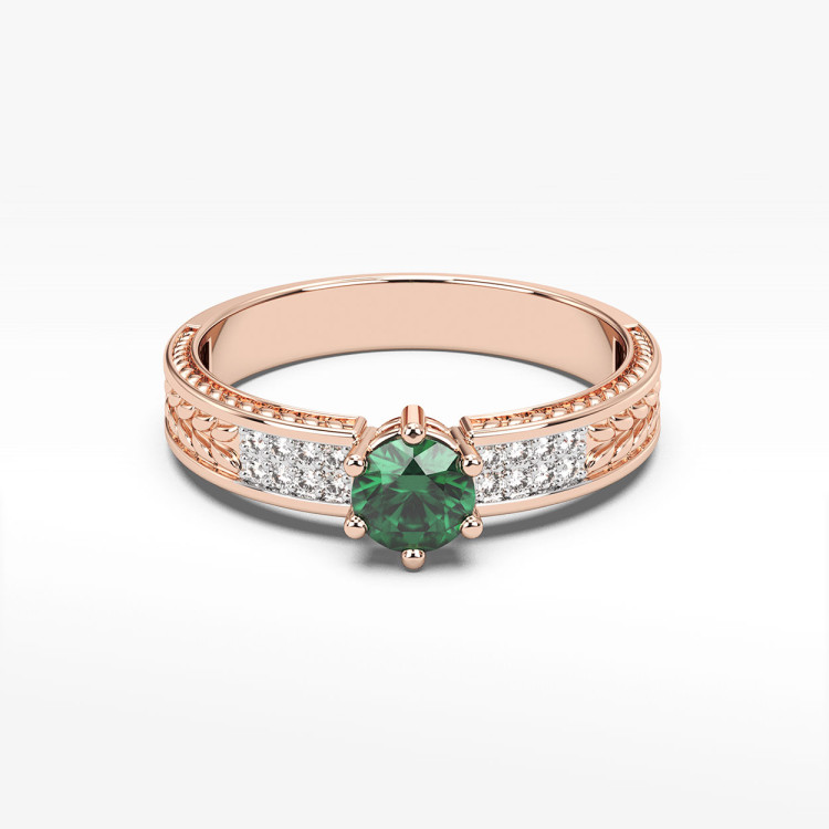 Pierścionek ze szmaragdami i diamentami