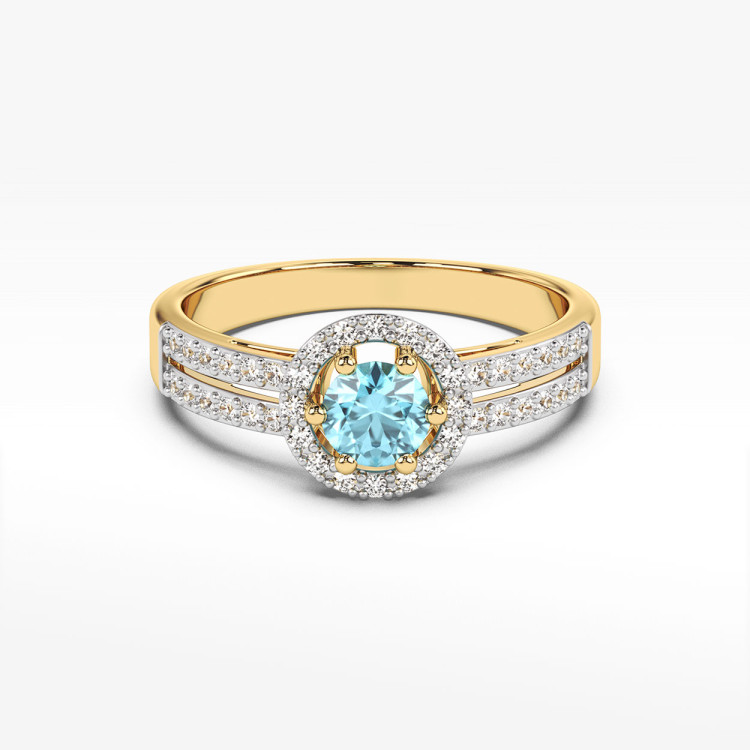 Złoty pierścionek z topazem i diamentami