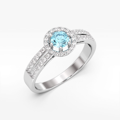 Złoty pierścionek z topazem i diamentami