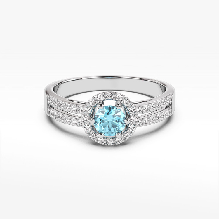 Złoty pierścionek z topazem i diamentami