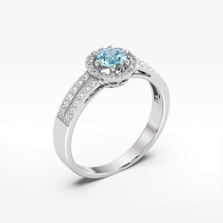 Złoty pierścionek z topazem i diamentami