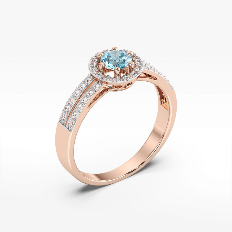 Złoty pierścionek z topazem i diamentami