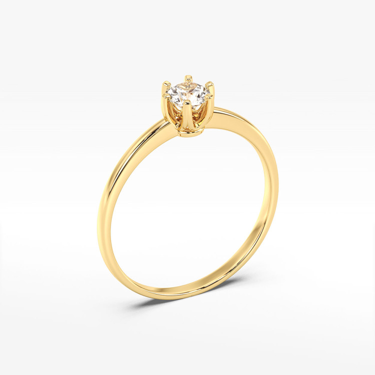 Klasyczny złoty pierścionek z diamentem