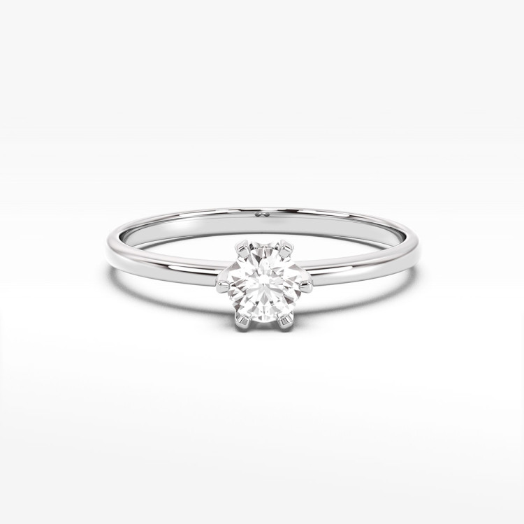 Klasyczny złoty pierścionek z diamentem