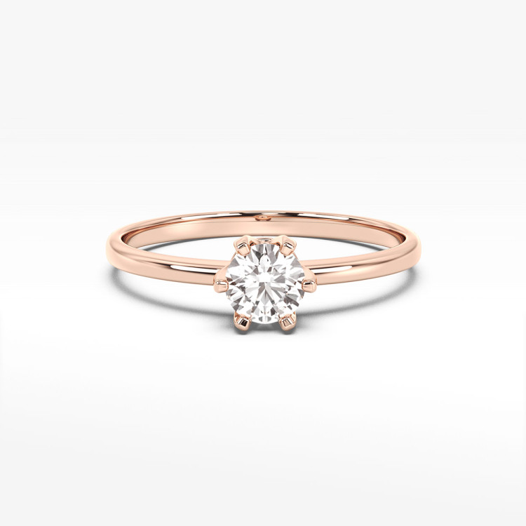 Pierścionek z diamentem z różowego złota