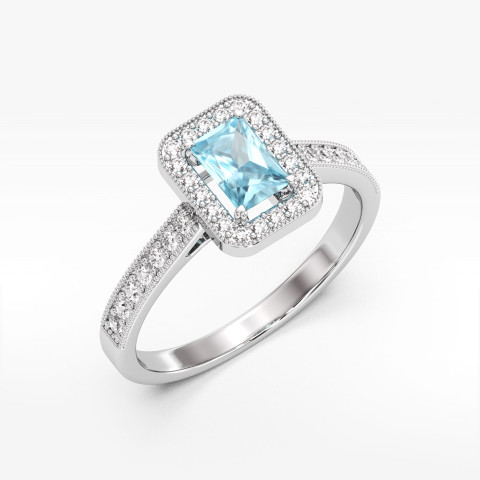 Złoty pierścionek z topazem i diamentami