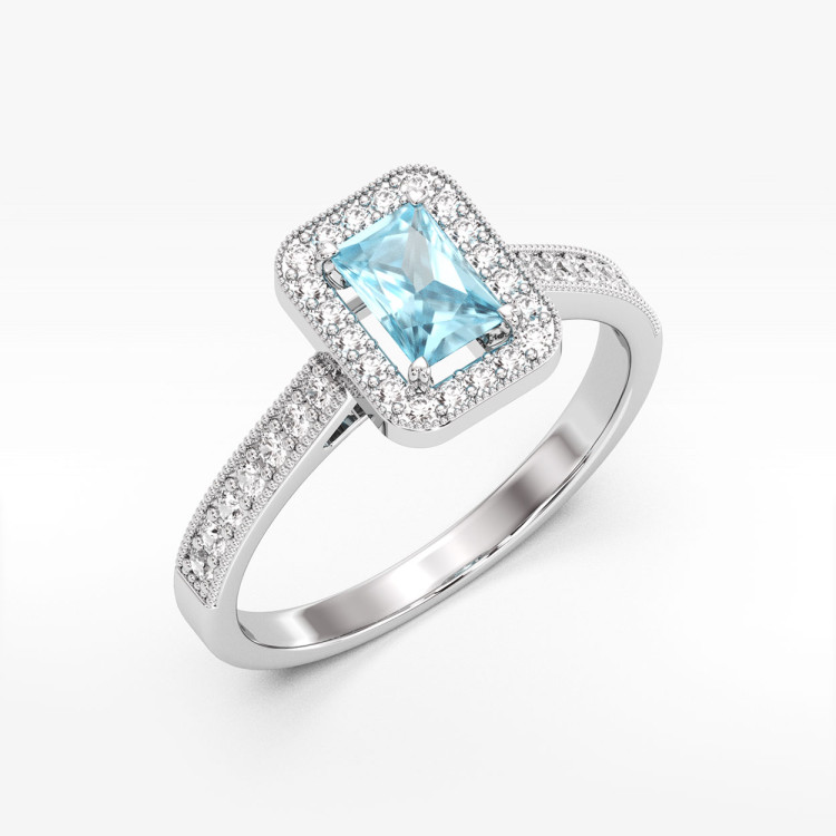 Złoty pierścionek z topazem i diamentami