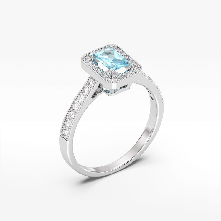 Złoty pierścionek z topazem i diamentami