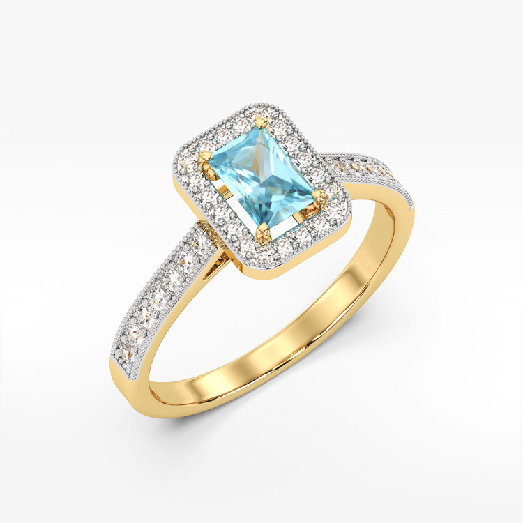 Złoty pierścionek z topazem i diamentami