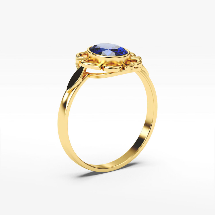 Pierścionek ze złota z niebieską cyrkonią