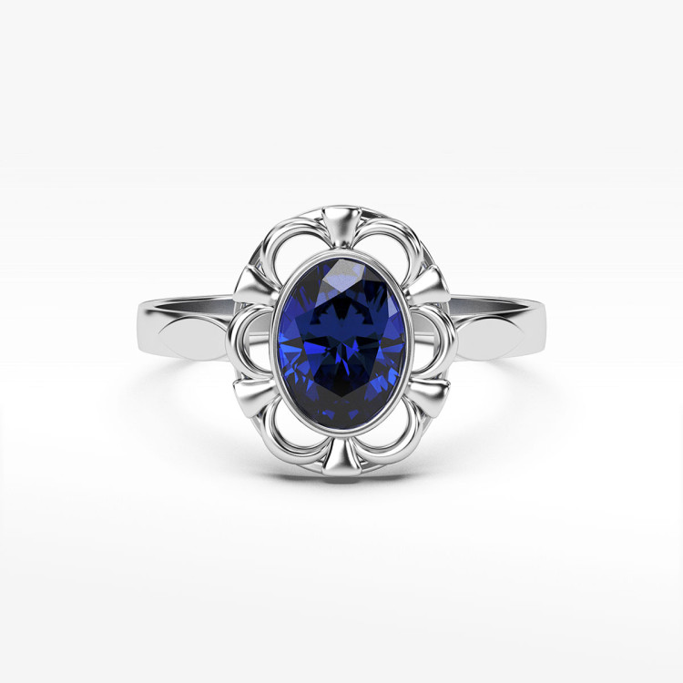 Pierścionek ze złota z niebieską cyrkonią