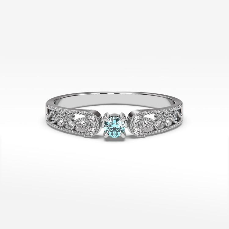 Pierścionek z diamentami i topazem