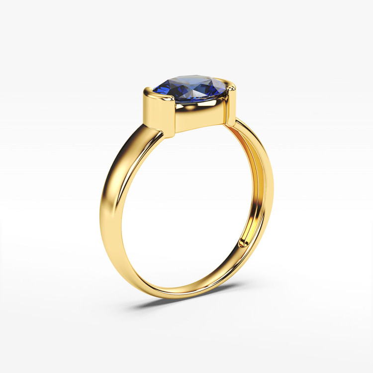 Pierścionek ze złota z niebieską cyrkonią