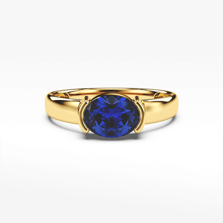 Pierścionek ze złota z niebieską cyrkonią