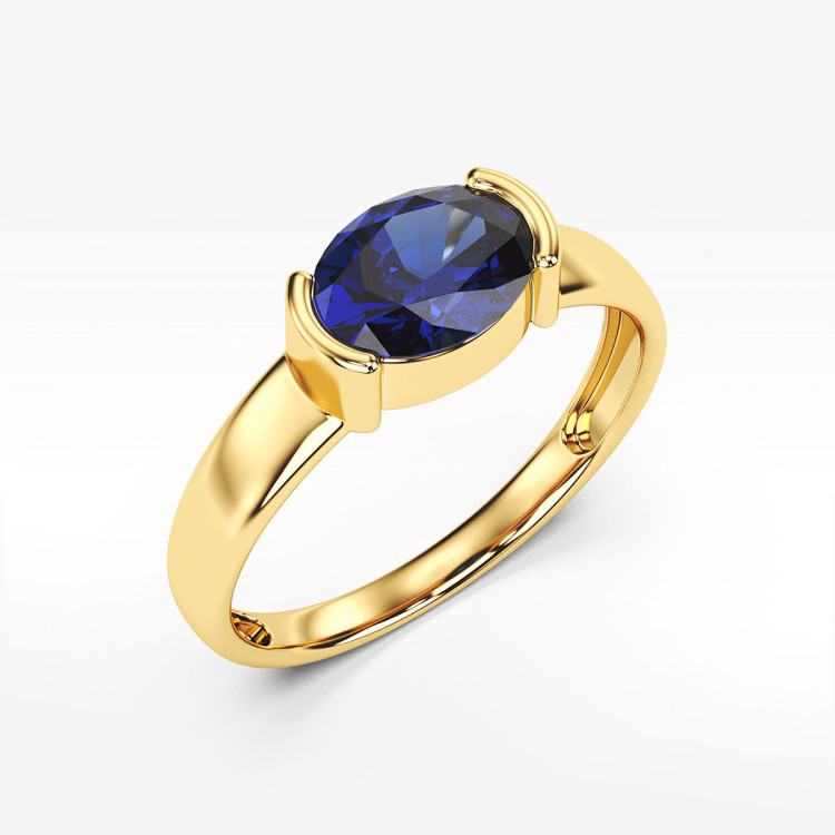 Pierścionek ze złota z niebieską cyrkonią
