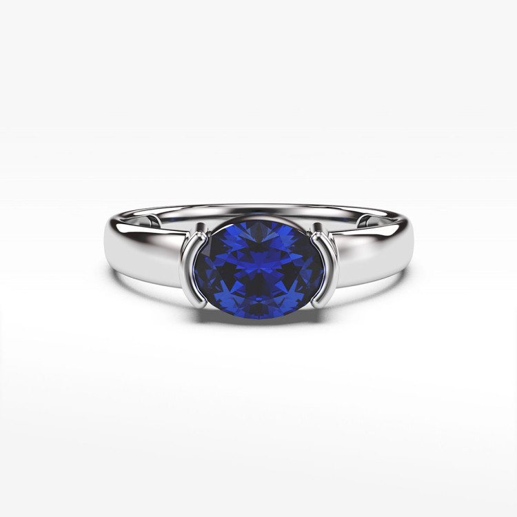 Pierścionek ze złota z niebieską cyrkonią