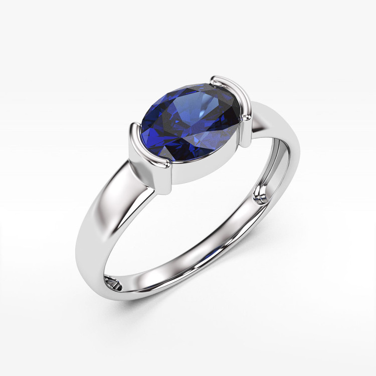 Pierścionek ze złota z niebieską cyrkonią