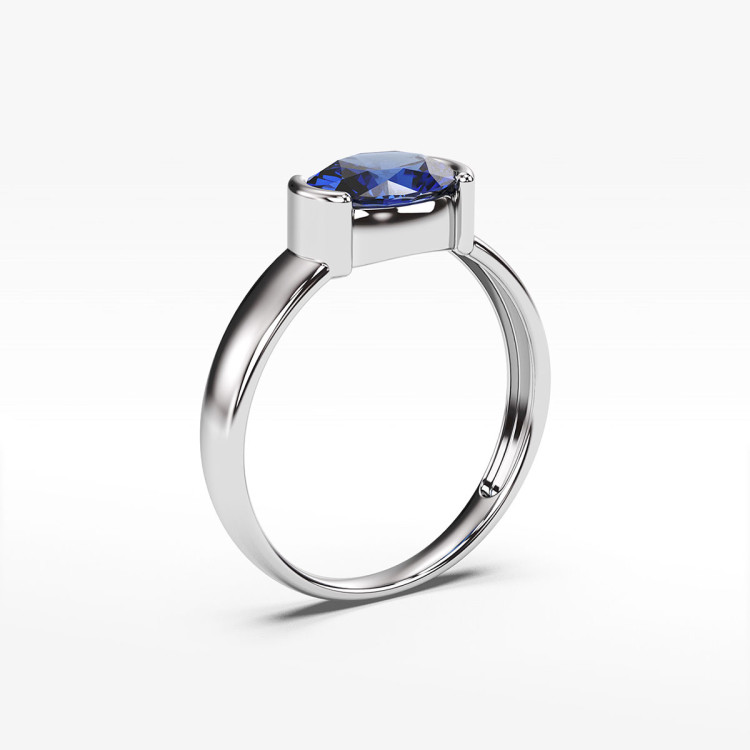 Pierścionek ze złota z niebieską cyrkonią