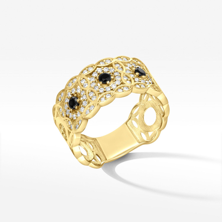 Pierścionek ze złota z czarnymi i białymi cyrkoniami
