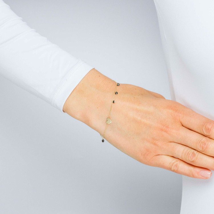 Bransoletka ze złota z sercem i koralikami