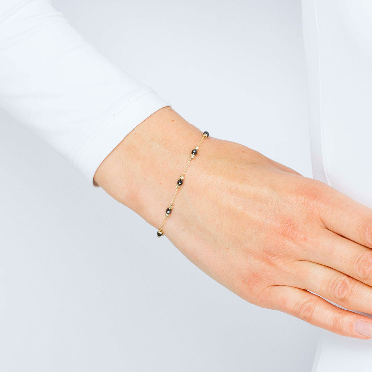 Bransoletka ze złota z koralikami