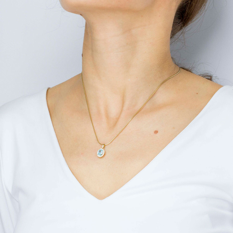 Zawieszka ze złota z niebieską i białymi cyrkoniami