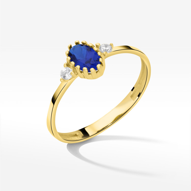 Pierścionek ze złota z niebieską i białymi cyrkoniami