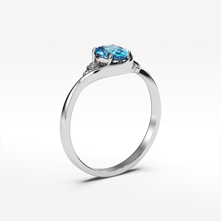 Pierścionek ze złota z niebieską cyrkonią