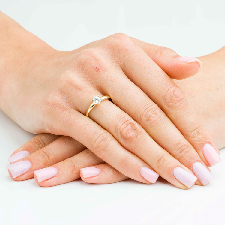 Pierścionek ze złota z białą cyrkonią