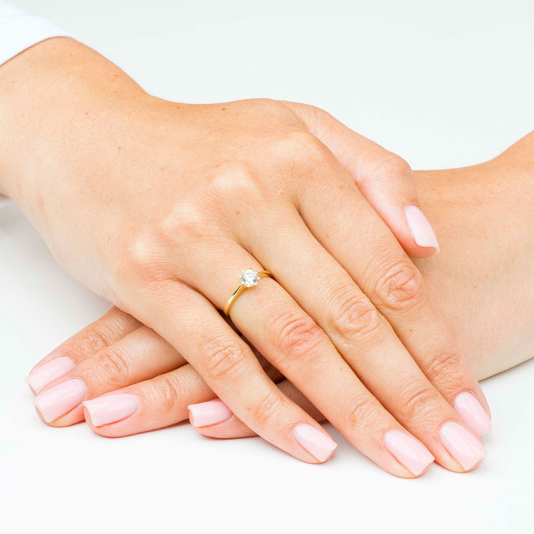 Pierścionek ze złota z białą cyrkonią