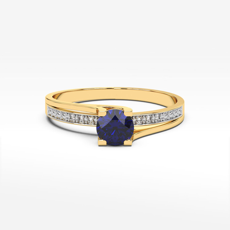 Pierścionek zaręczynowy z szafirem i diamentami
