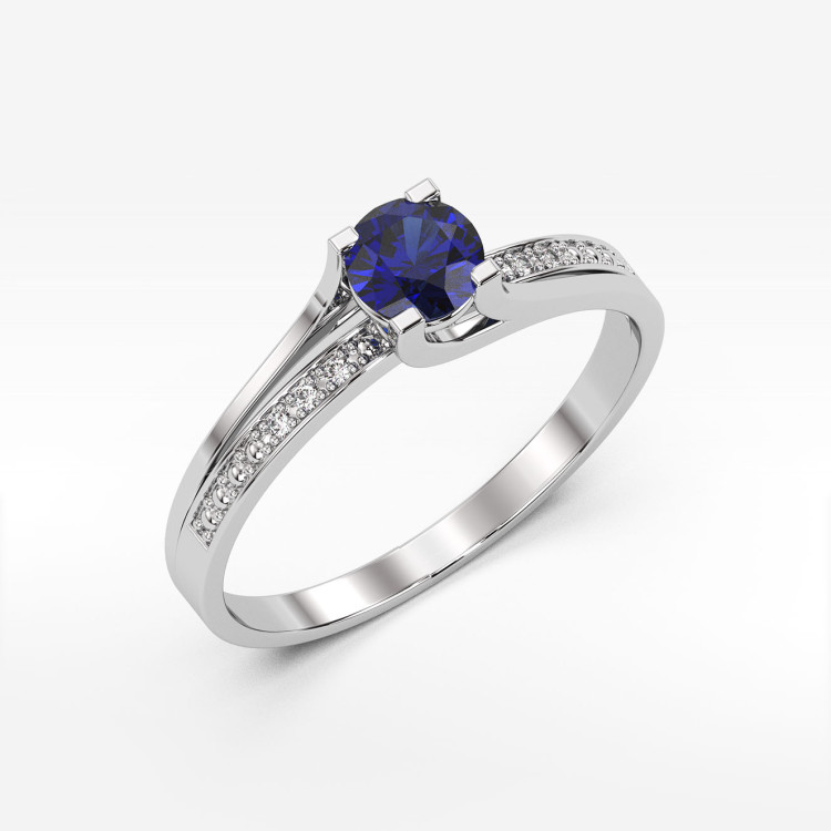 Pierścionek zaręczynowy z szafirem i diamentami