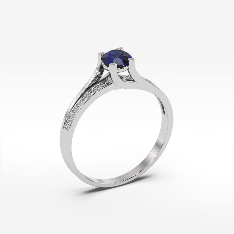 Pierścionek zaręczynowy z szafirem i diamentami
