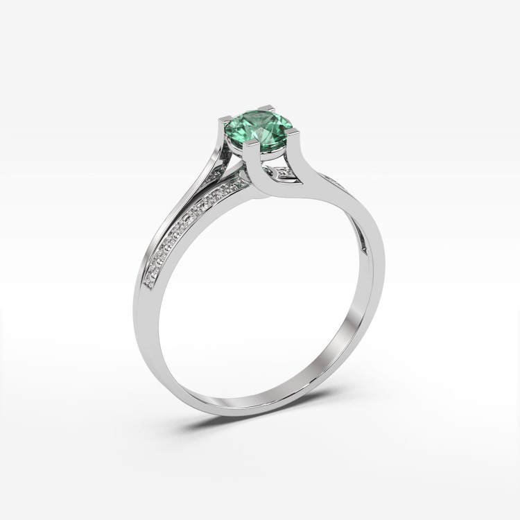 Pierścionek zaręczynowy ze szmaragdem i diamentami