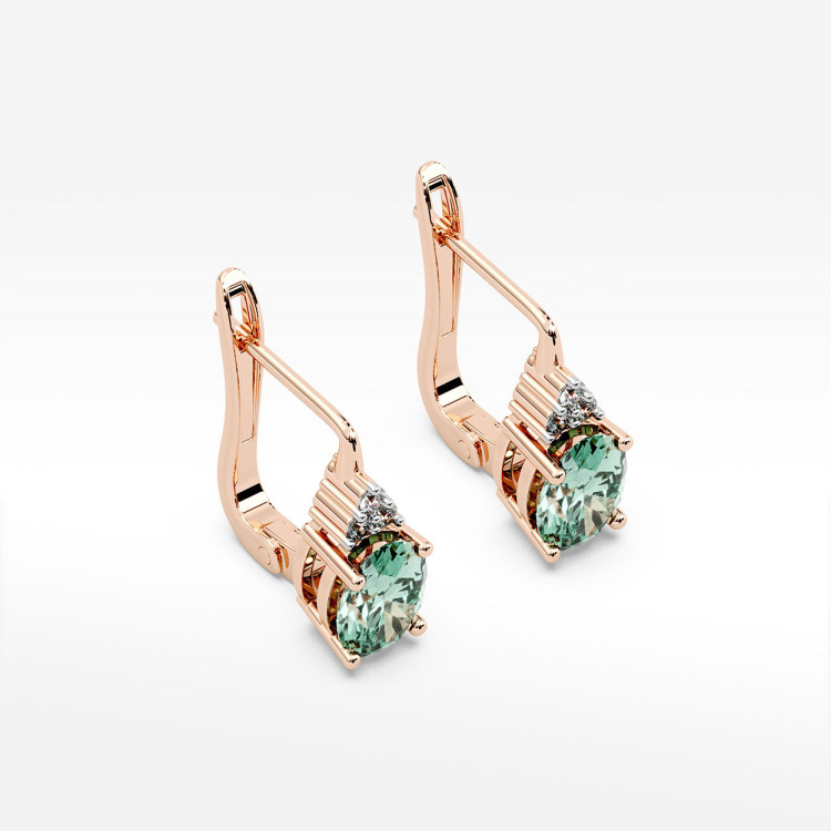 Złote kolczyki z szmaragdem i diamentami