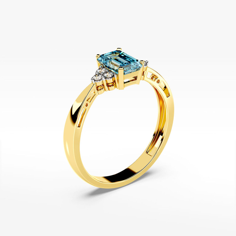 Złoty pierścionek z topazem i diamentami