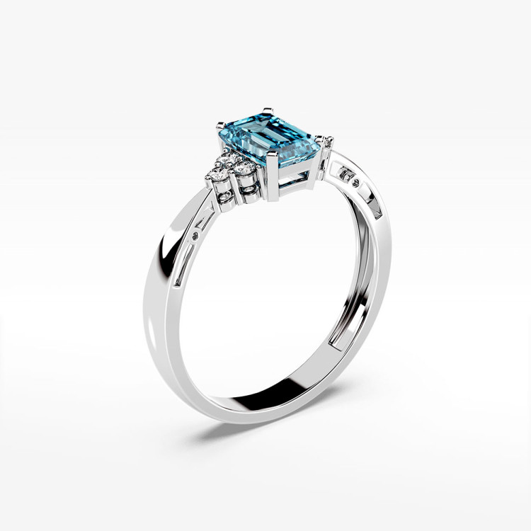 Złoty pierścionek z topazem i diamentami